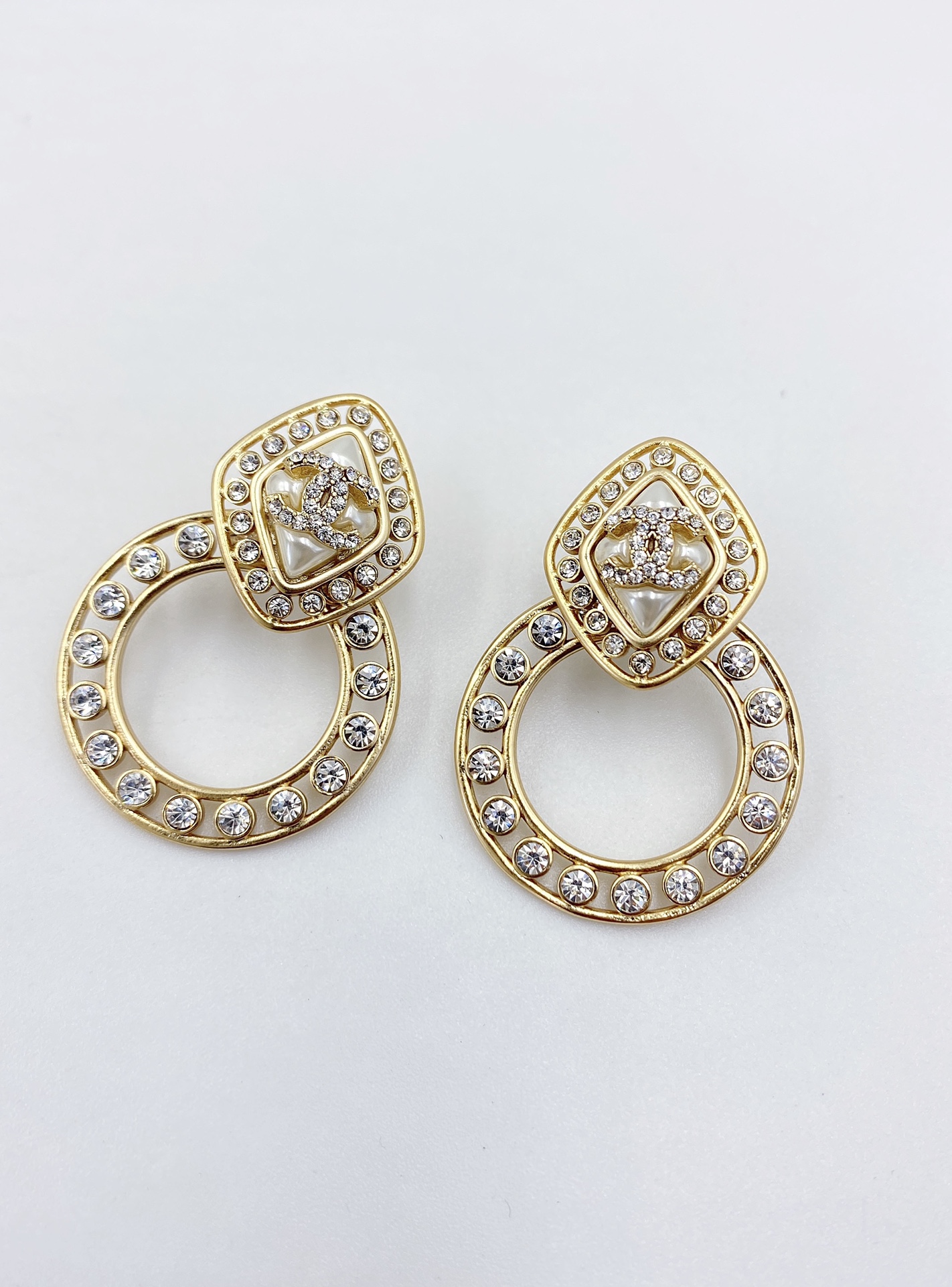 Ch**el Sparkling Stone Border Earrings Gold Tone For Women