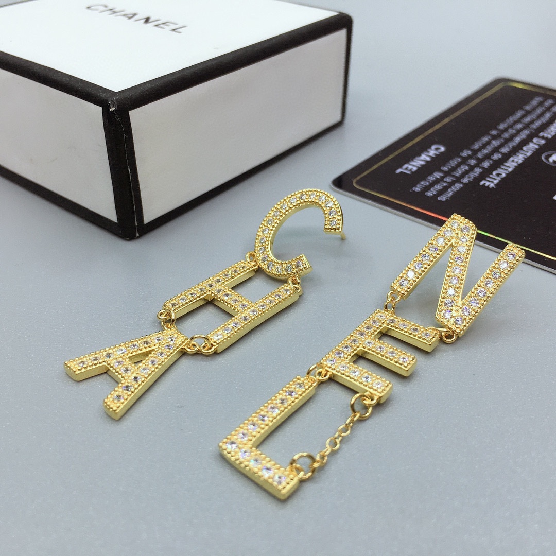 Ch**el The Letter C-H-A N-E-L Frame Earrings Gold Tone For Women
