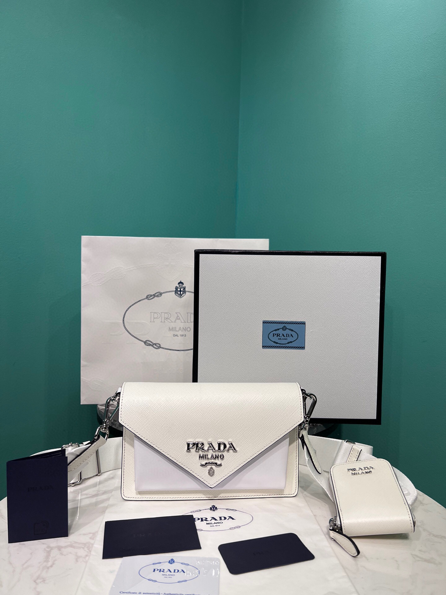 Pra*a Saffiano Mini Envelope Bag In White For Women 7.8 in/ 20cm 1BP020_2EVU_F0009_V_N2O