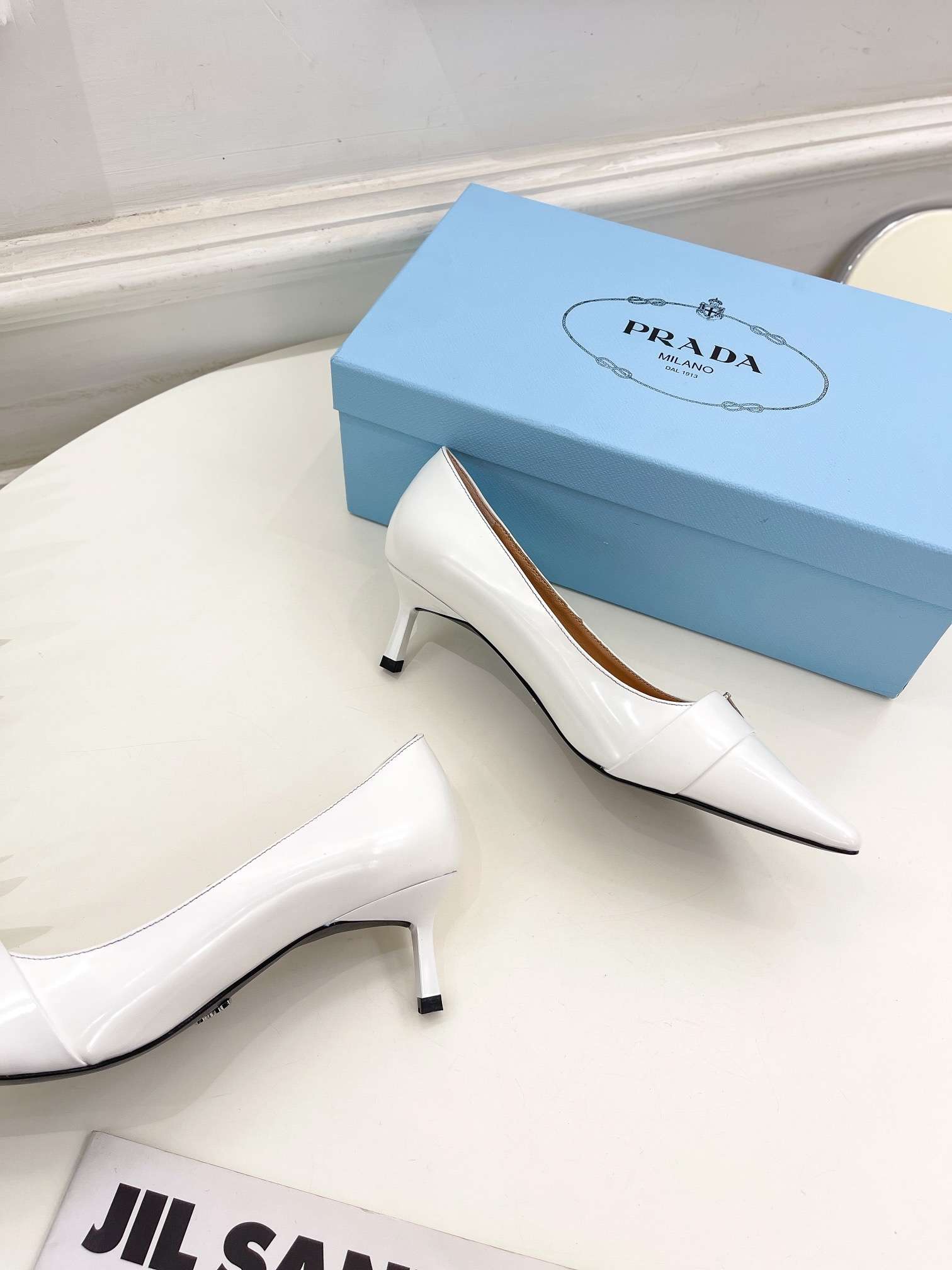 Pra*a Soft Pointed Heel Pumps White For Women