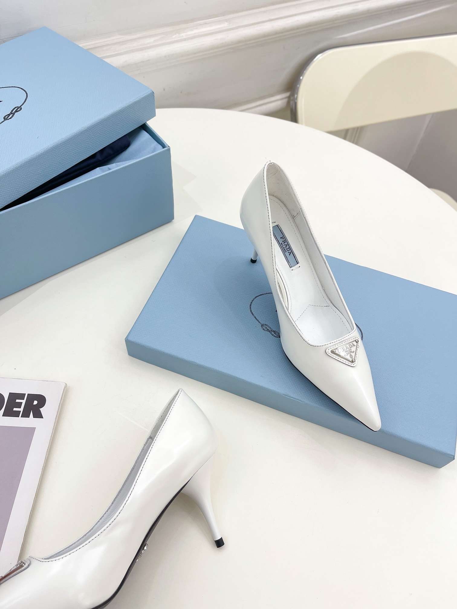 Pra*a Spike Pumps White For Women