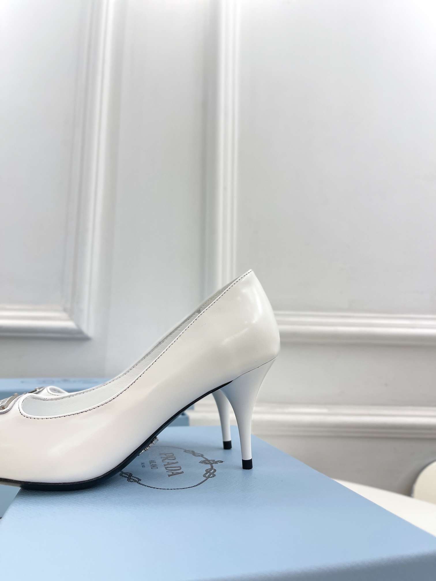 Pra*a Spike Pumps White For Women