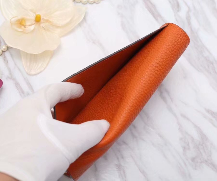 H**me5 Constance Togo Long Wallet 20cm/7.9in Silver Toned Hardware For Women Orange
