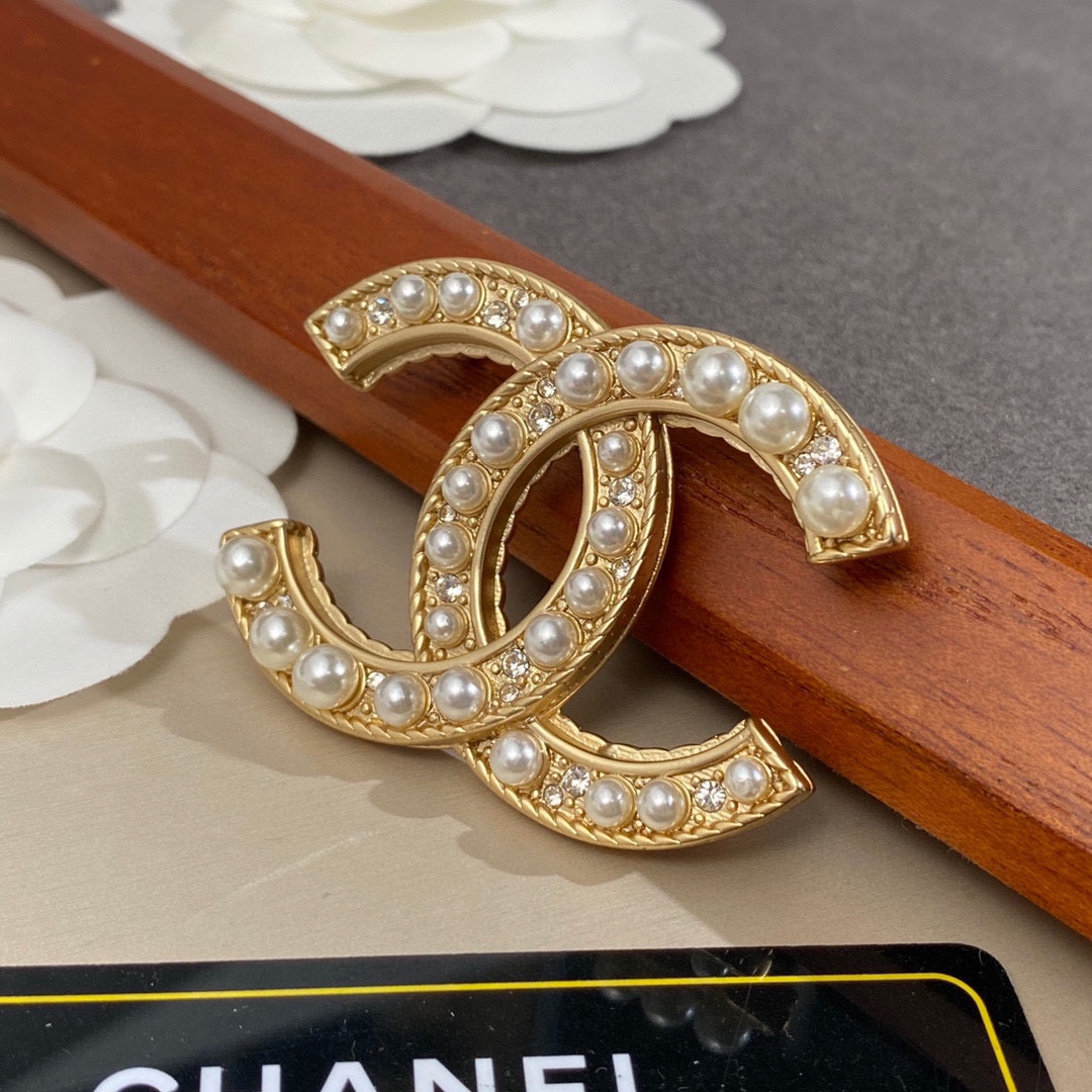 Ch**el Brooch